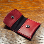 The Cowhide Coin Wallet (Red) by Bacon Magic – Trick